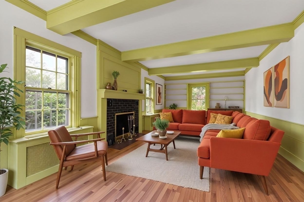 17 Pine Road Sharon, MA 02067 - Photo 8 of 33 a living room with furniture and a fireplace