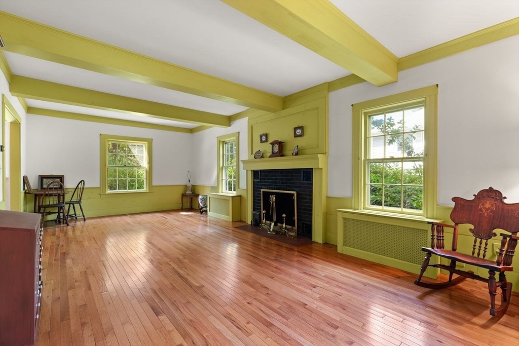 17 Pine Road Sharon, MA 02067 - Photo 9 of 33 a living room with furniture and a fireplace
