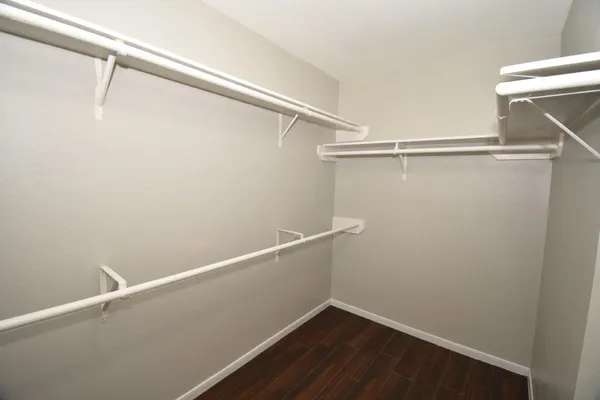a view of an empty walk in closet