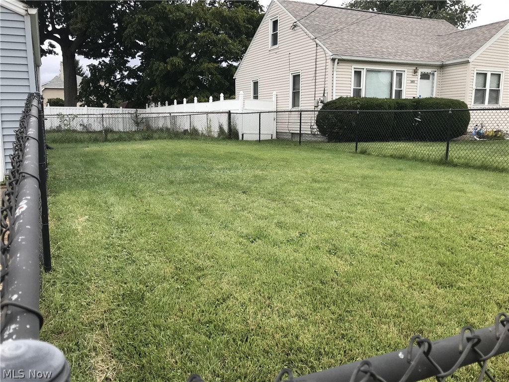 1260 Raff Road Southwest Canton, OH 44710 - Photo 16 of 16 Fully fenced yard located on the side of the home.