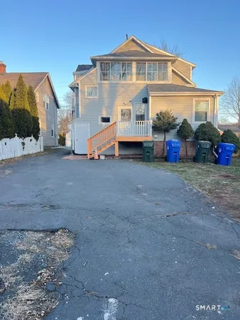 a view of a house with backyard