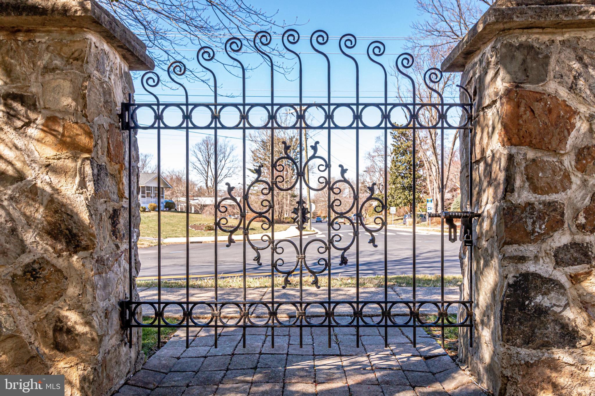 3601 Old Post Road Fairfax, VA 22030 - Photo 4 of 78 Custom stone walls and wrought iron gate and fence