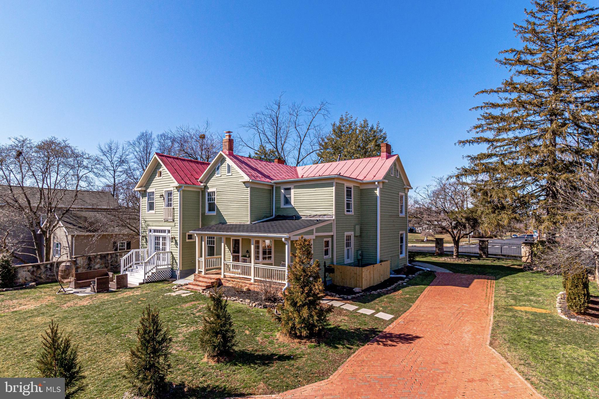 3601 Old Post Road Fairfax, VA 22030 - Photo 8 of 78 Standing Seam Metal roof & Brick Driveway