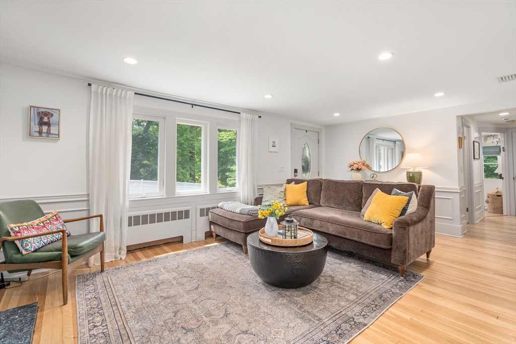 57 Marlboro Road Sudbury, MA 01776 - Photo 10 of 40 a living room with furniture and a large window