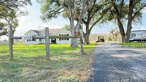a view of a house with a park