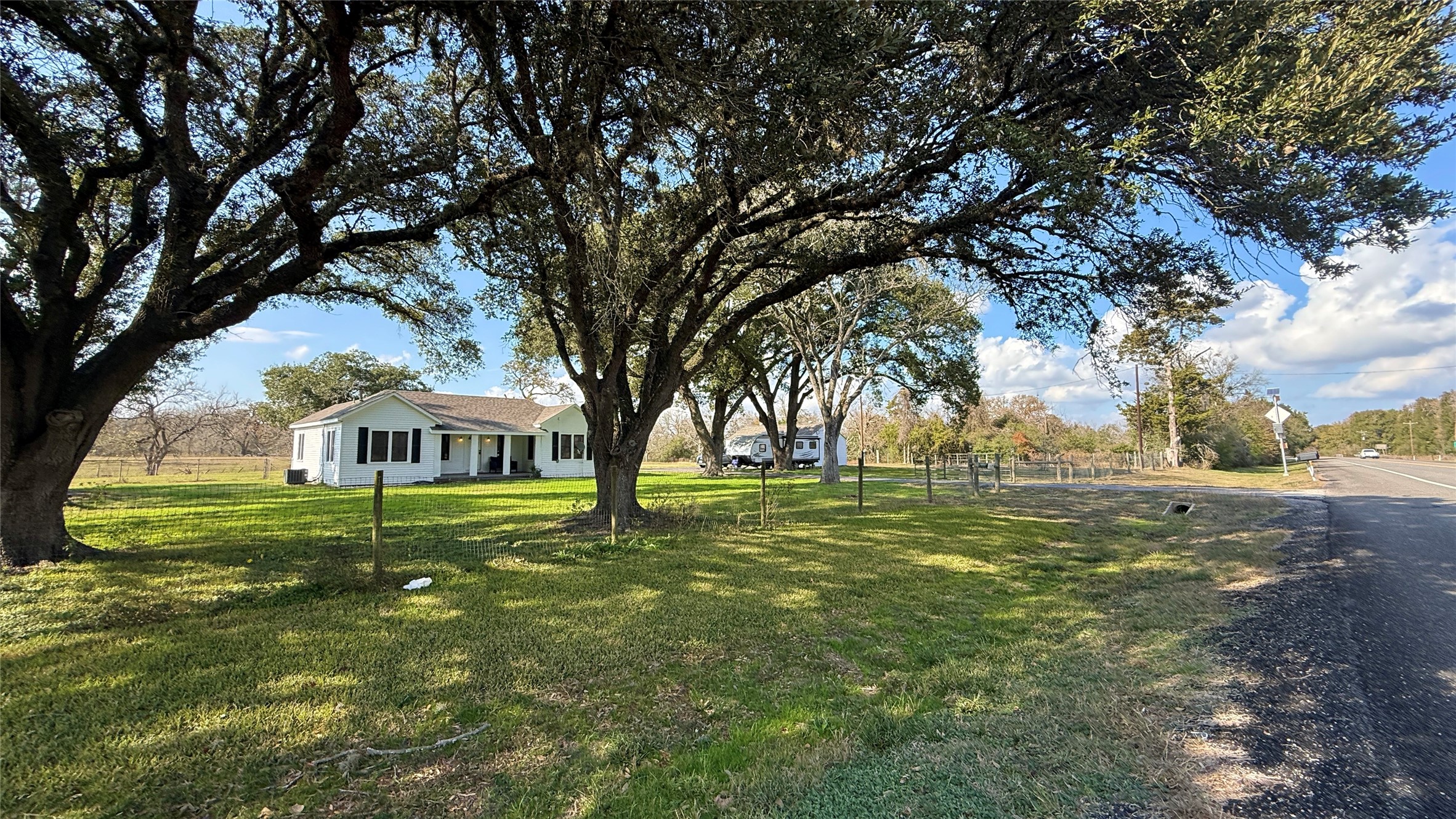 13309 Farm To Market 359 Hempstead, TX 77445 - Photo 6 of 34 a view of a house with a yard