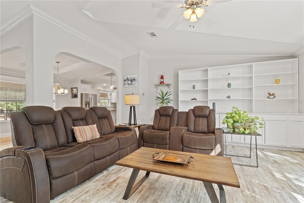 9410 Southwest 156th Place Dunnellon, FL 34432 - Photo 13 of 56 a living room with furniture potted plant and a window