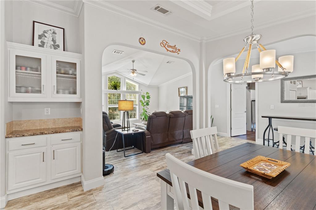 9410 Southwest 156th Place Dunnellon, FL 34432 - Photo 14 of 56 a living room with furniture and wooden floor
