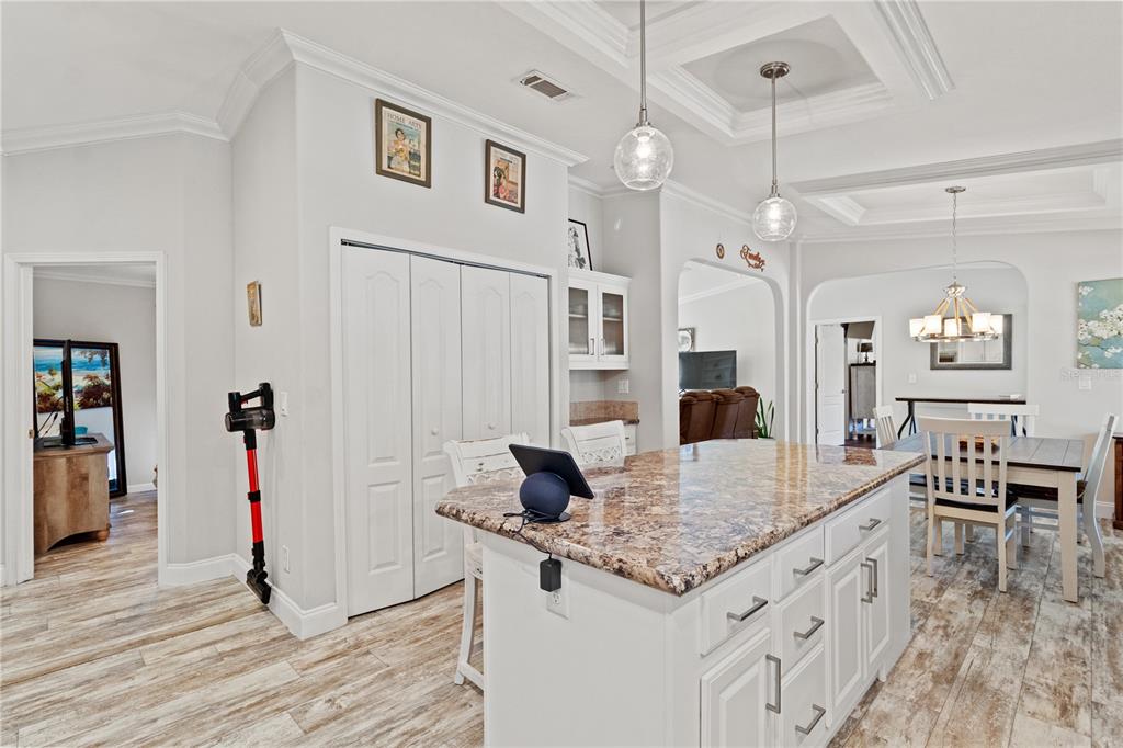9410 Southwest 156th Place Dunnellon, FL 34432 - Photo 16 of 56 a kitchen with stainless steel appliances granite countertop a stove and refrigerator