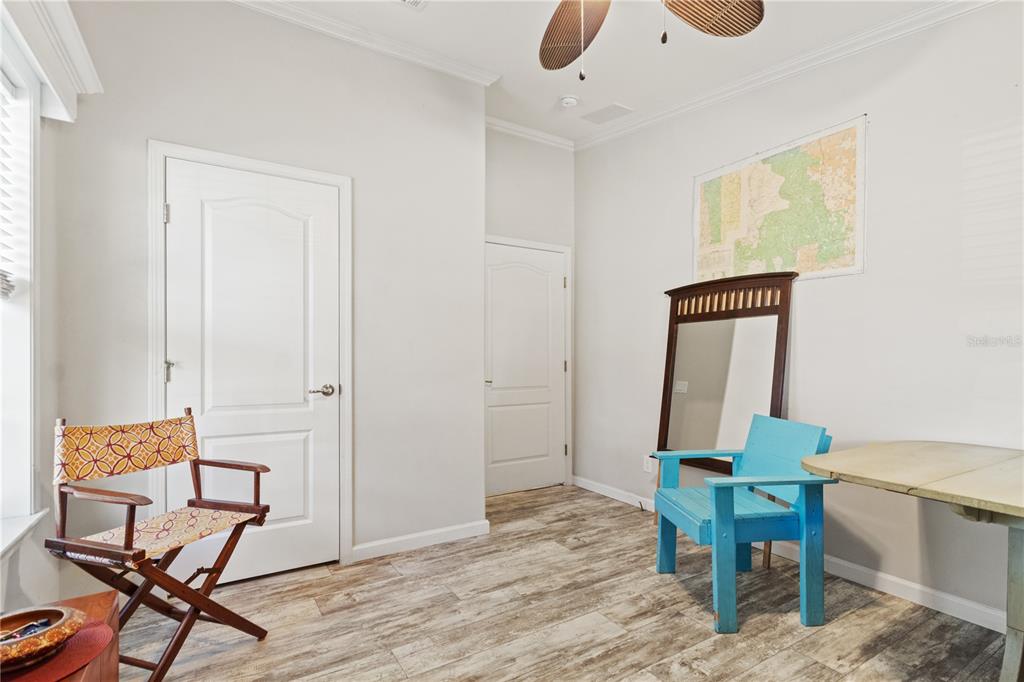 9410 Southwest 156th Place Dunnellon, FL 34432 - Photo 28 of 56 a workspace with furniture and wooden floor