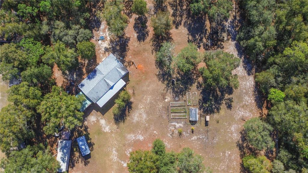 9410 Southwest 156th Place Dunnellon, FL 34432 - Photo 48 of 56 an aerial view of residential house with outdoor space