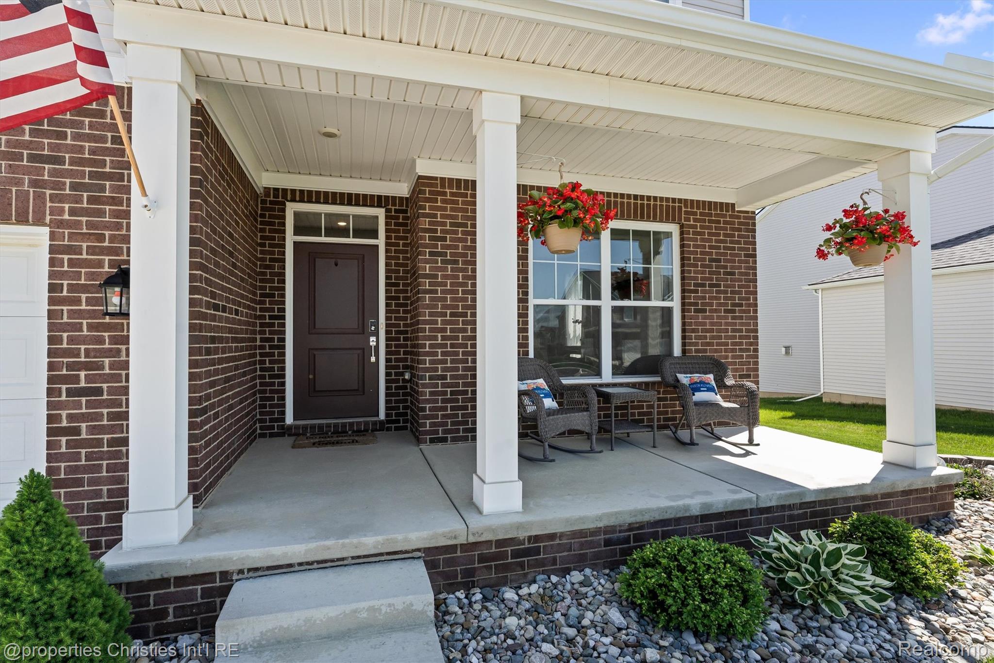 2721 Maize Loop Saline, MI 48176 - Photo 5 of 52 Entrance to property with a porch and brick siding
