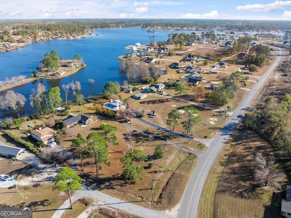 an aerial view of a building with outdoor space