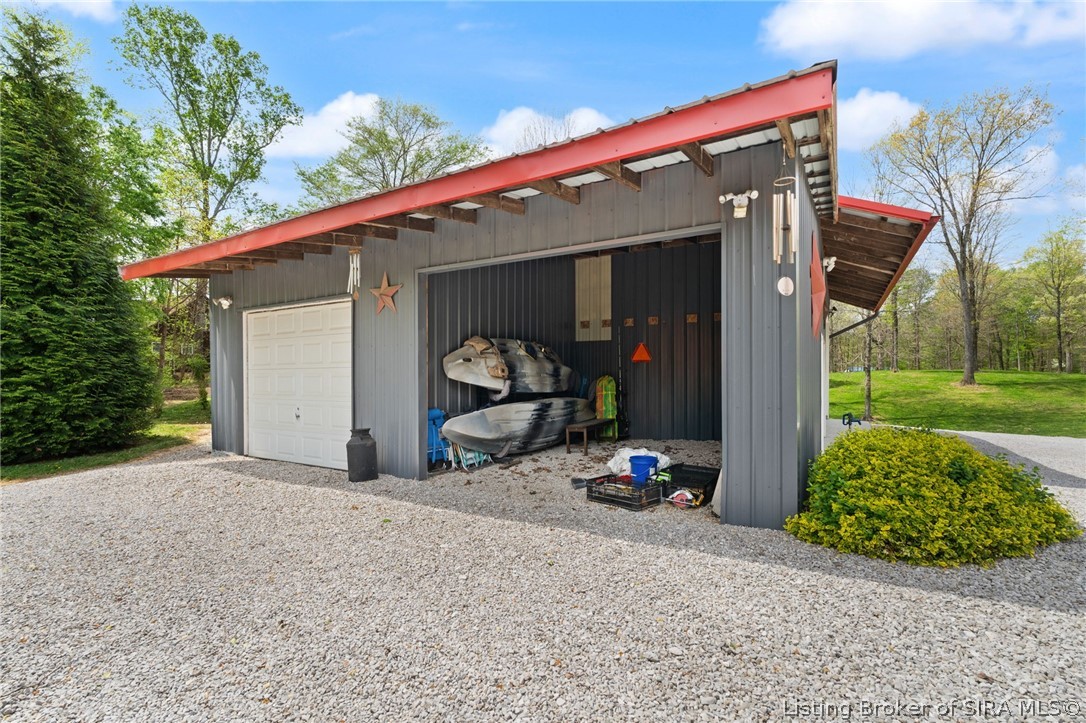 13552 Corydon Ramsey Road Northwest Palmyra, IN 47164 - Photo 11 of 83 Detached garage with bathroom and hangout area