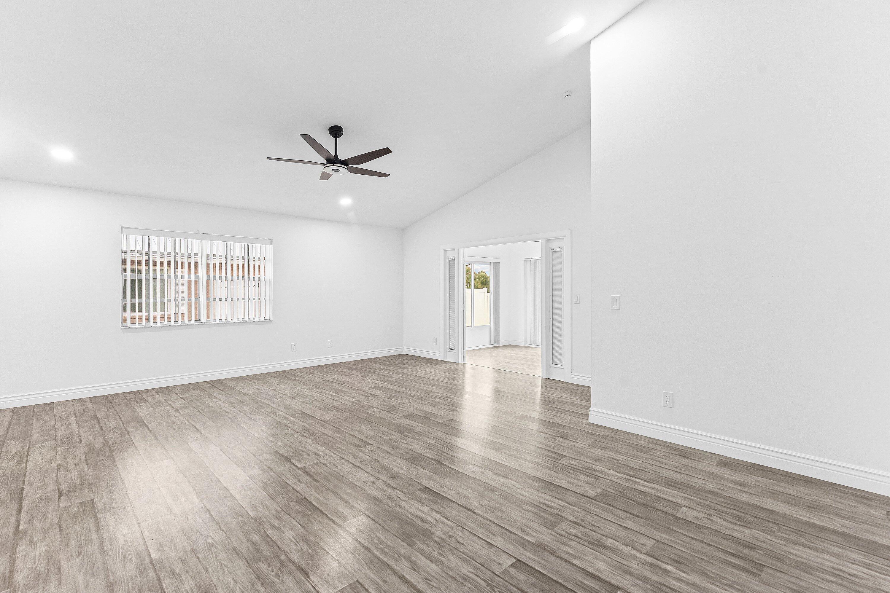 125 Raintree Trail Jupiter, FL 33458 - Photo 6 of 46 006-125RaintreeTrail-Jupiter-FL-33458-SM