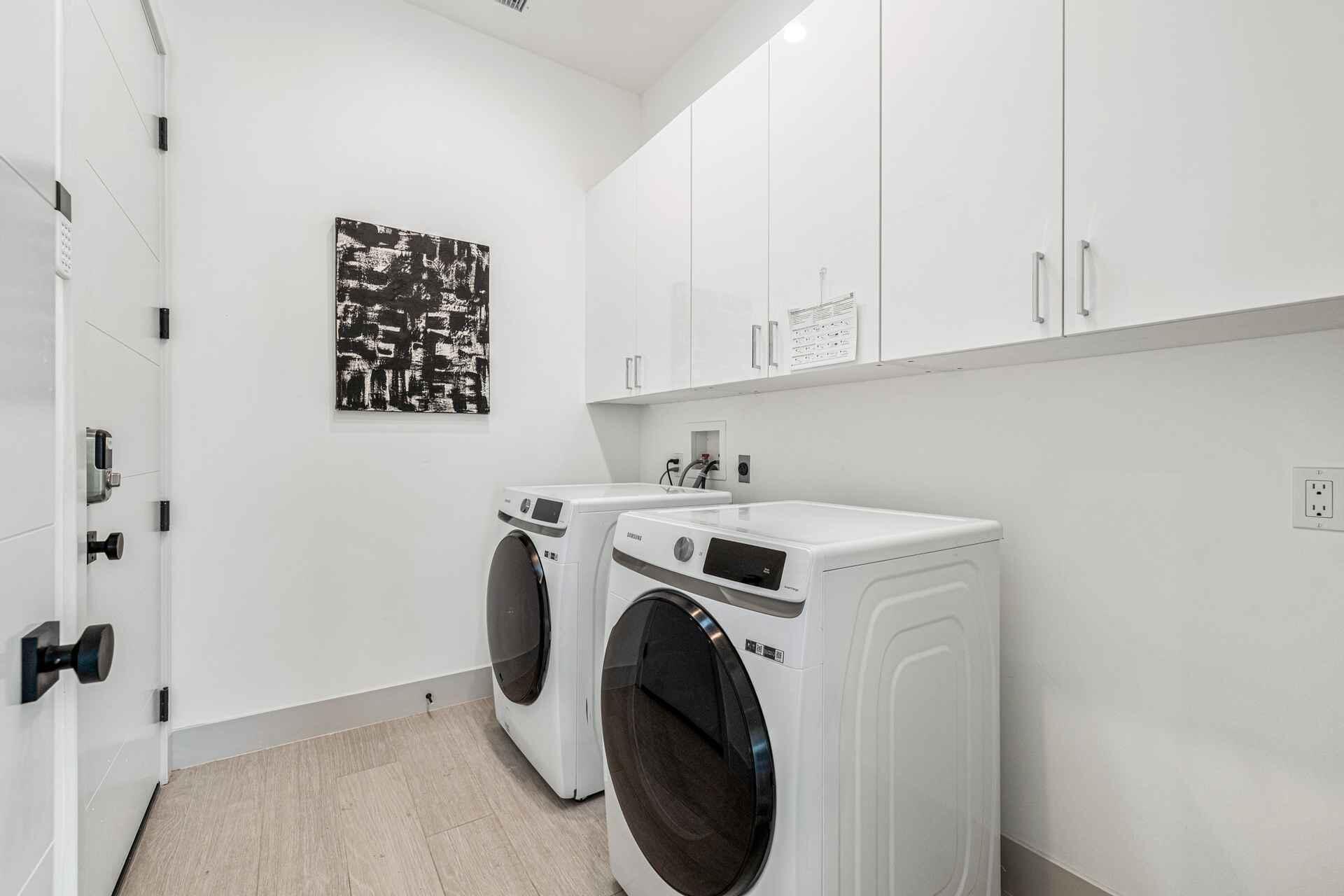 72985 Somera Road Palm Desert, CA 92260 - Photo 29 of 33 a utility room with dryer and washer