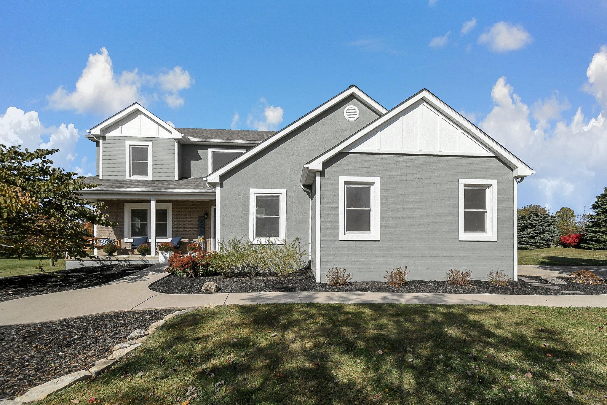 3620 Hyatts Road Powell, OH 43065 - Photo 3 of 54 Front of home - painted grey with white trim.