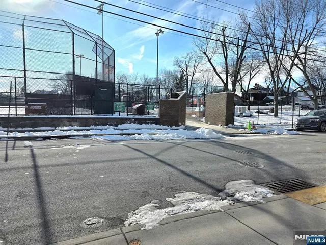 a view of a building with a street
