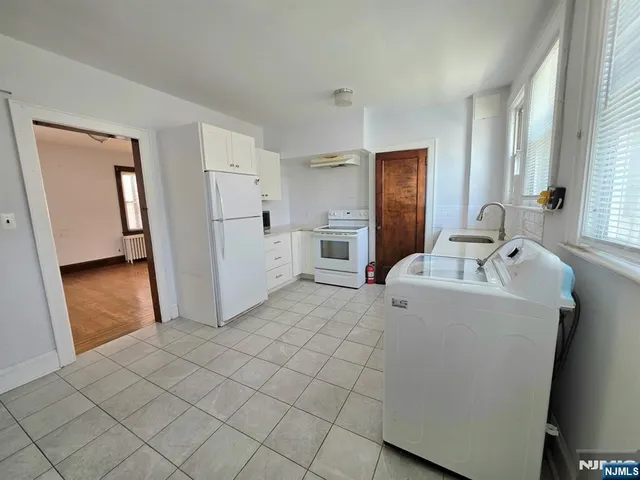 a room with a washer and dryer