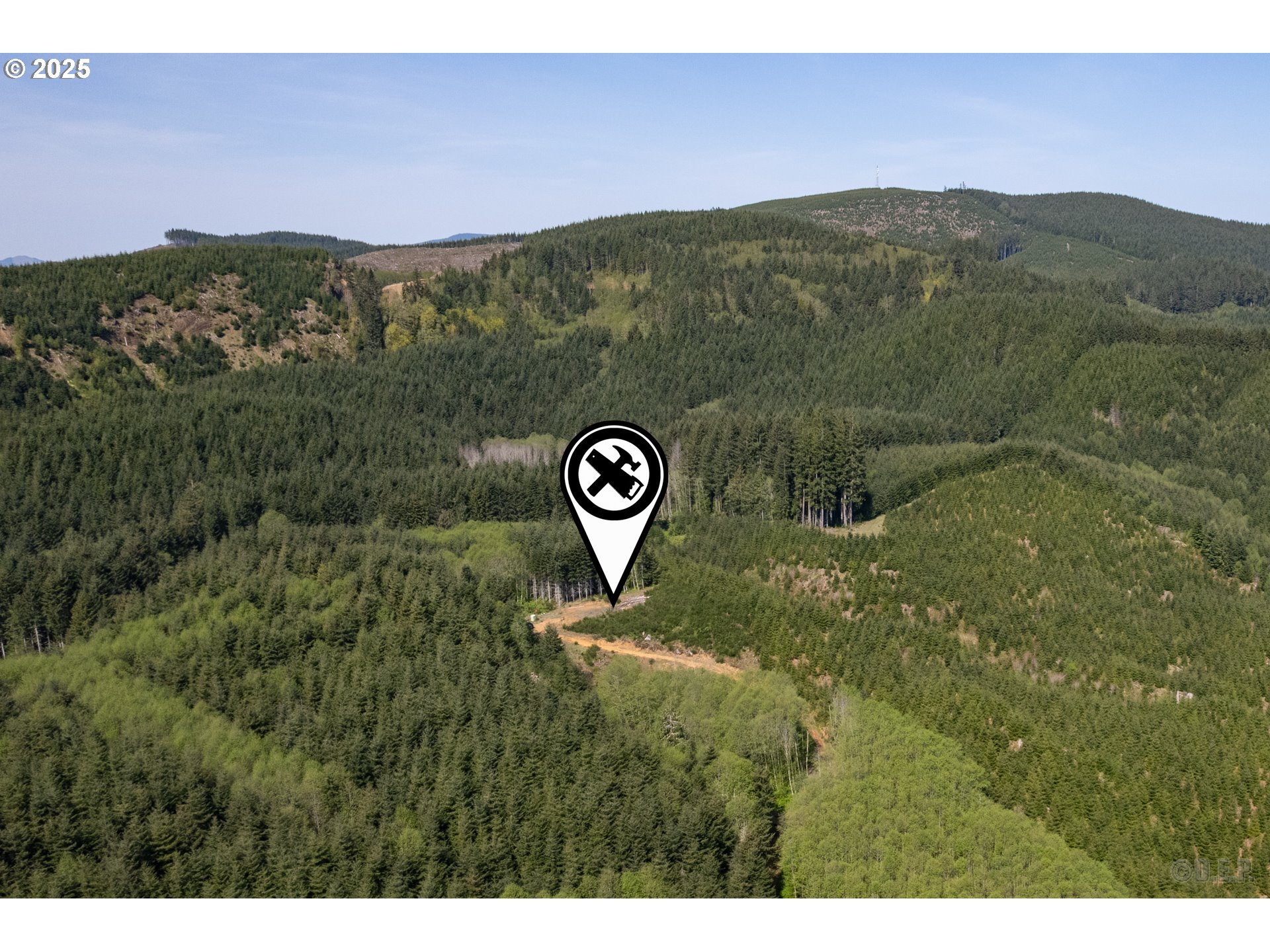0 Conyers Creek Road Clatskanie, OR 97016 - Photo 11 of 13 a view of a lush green field with mountains in the background