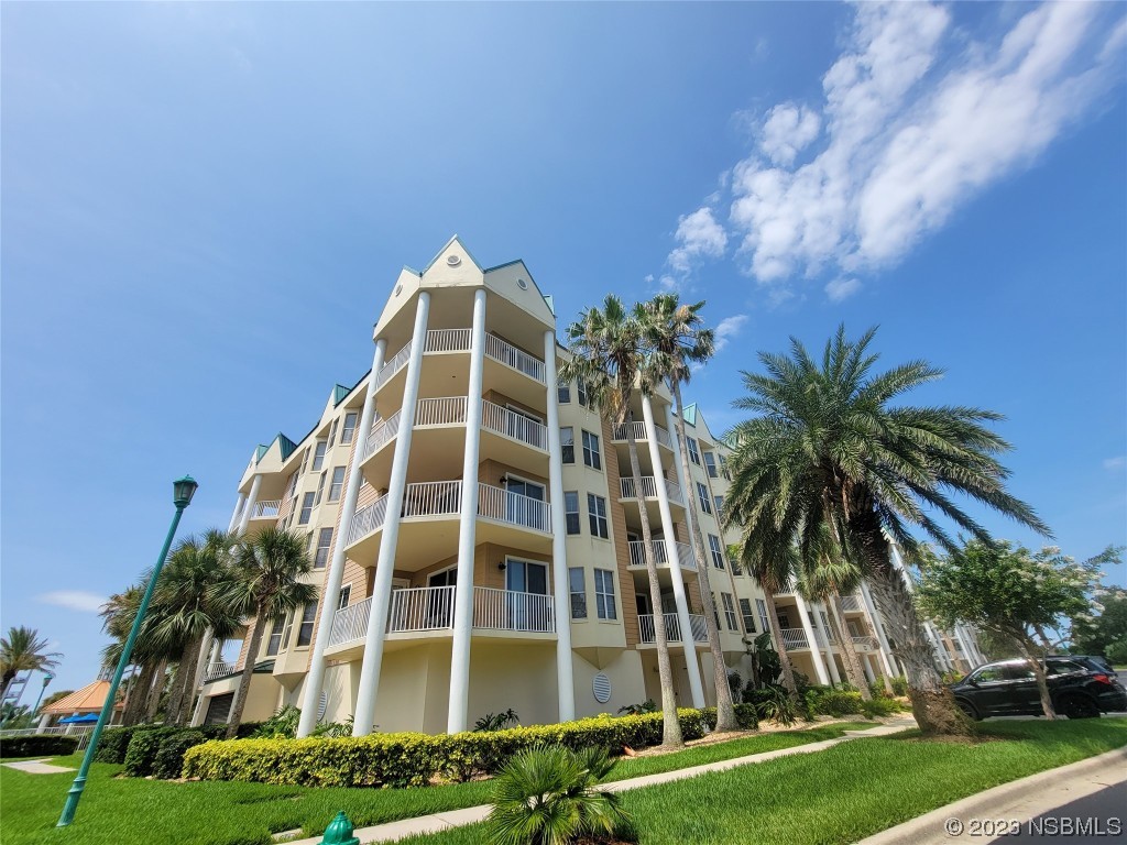 4623 Rivers Edge Village Lane, Unit 6204 Ponce Inlet, FL 32127 - Photo 2 of 62 a view of a multi story building