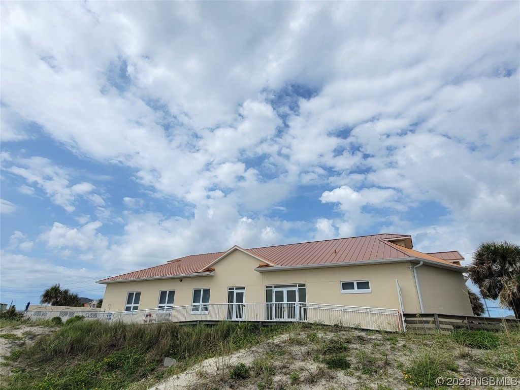 4623 Rivers Edge Village Lane, Unit 6204 Ponce Inlet, FL 32127 - Photo 23 of 62 a view of house with garden and entertaining space