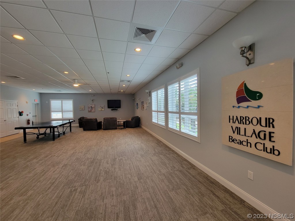 4623 Rivers Edge Village Lane, Unit 6204 Ponce Inlet, FL 32127 - Photo 33 of 62 a view of a room with gym equipment and a window