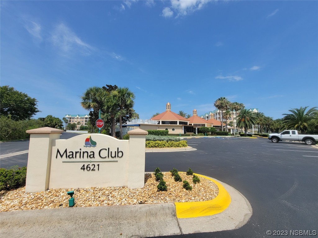 4623 Rivers Edge Village Lane, Unit 6204 Ponce Inlet, FL 32127 - Photo 35 of 62 a sign on the side of a road