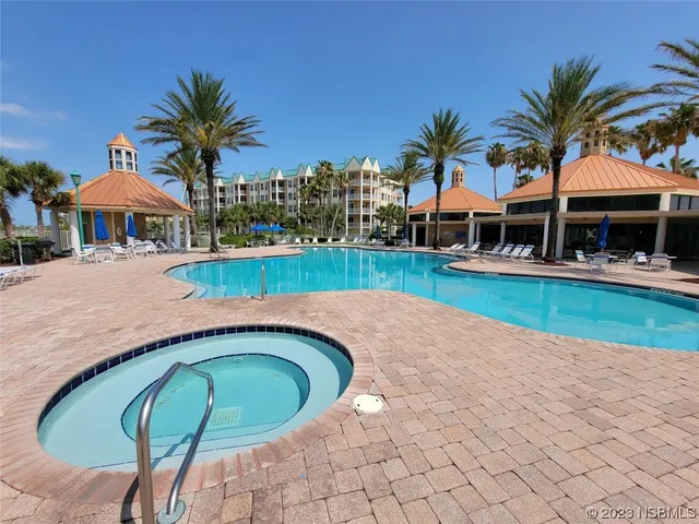 a view of a garden and basketball court