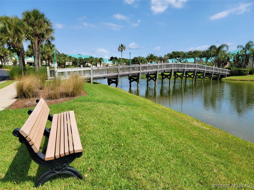4623 Rivers Edge Village Lane, Unit 6204 Ponce Inlet, FL 32127 - Photo 45 of 62 a view of a lake with houses with outdoor space and lake view