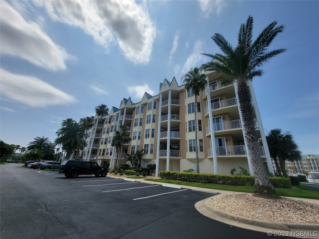 4623 Rivers Edge Village Lane, Unit 6204 Ponce Inlet, FL 32127 - Photo 46 of 62 a view of multiple building