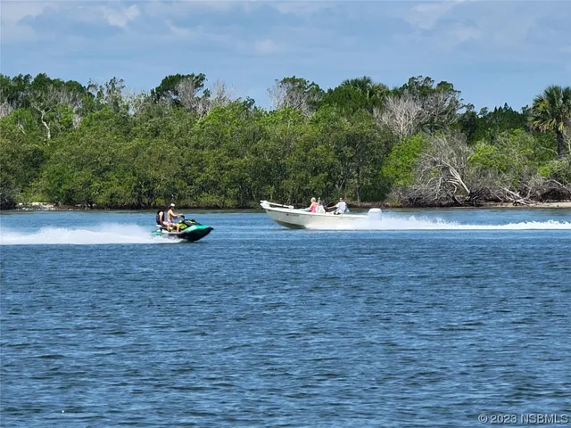 a vase of flowers sitting on a table