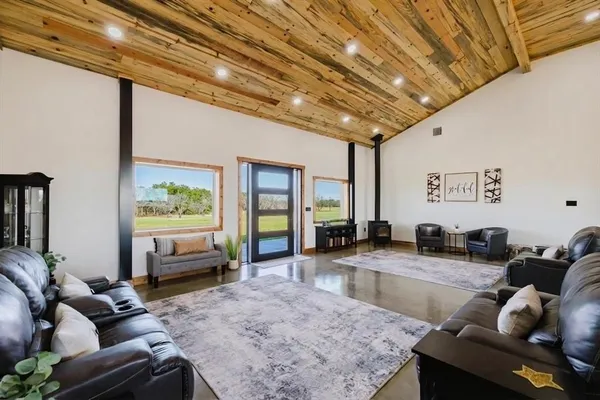 a bathroom with a sink mirror and toilet