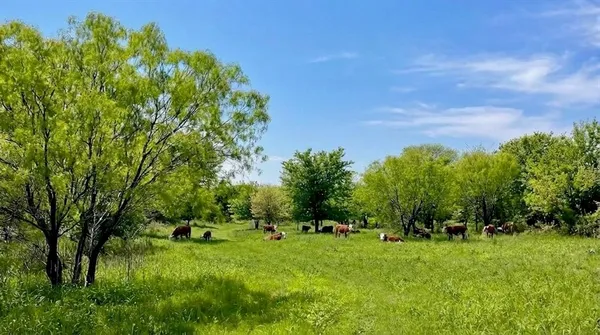 a view of a storage & utility room with two washing machine