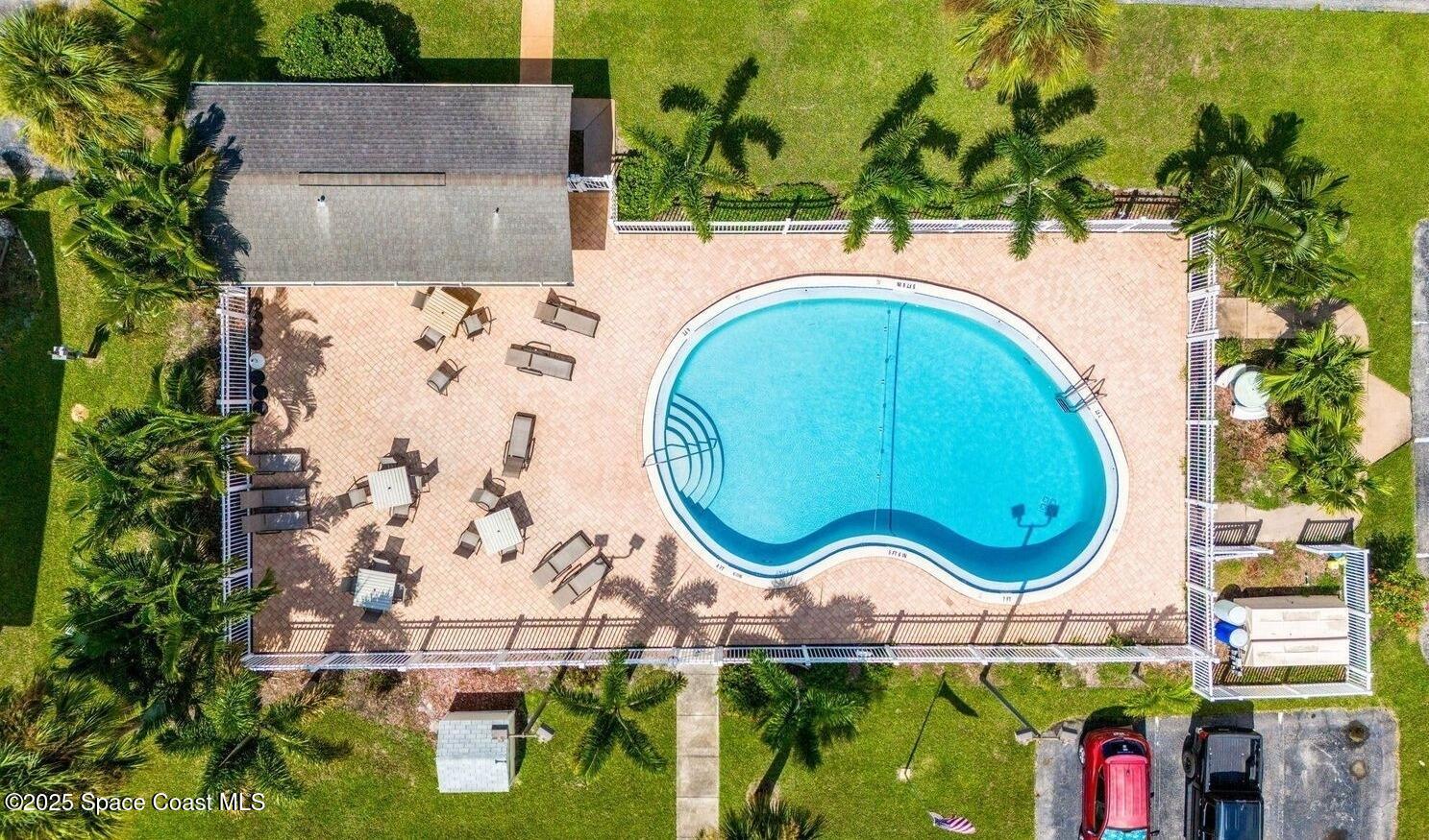 2314 Manor Drive Northeast Palm Bay, FL 32905 - Photo 22 of 23 an aerial view of a house with a swimming pool