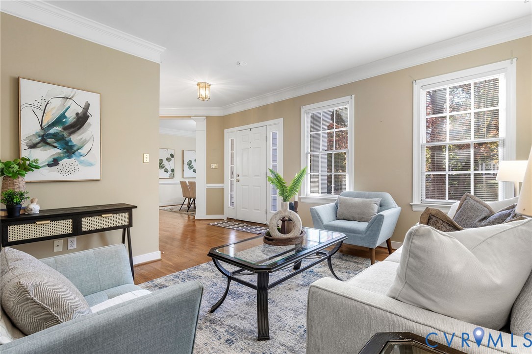 1608 Fairfield Green Road Henrico, VA 23238 - Photo 16 of 35 a living room with furniture and a potted plant