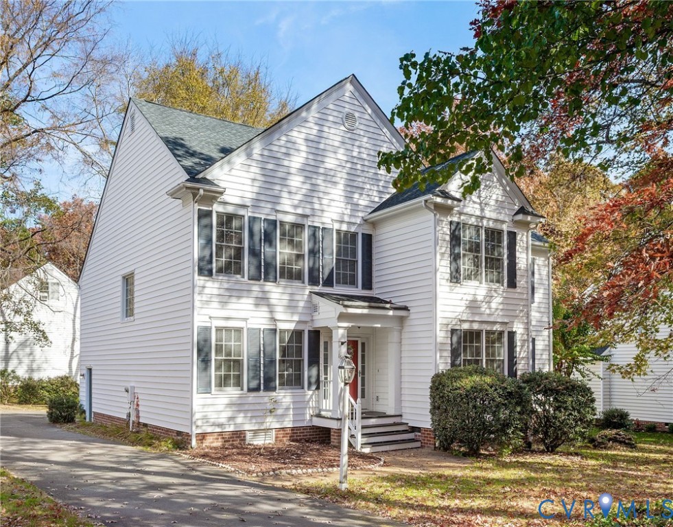 1608 Fairfield Green Road Henrico, VA 23238 - Photo 2 of 35 a front view of a house with a yard and garage