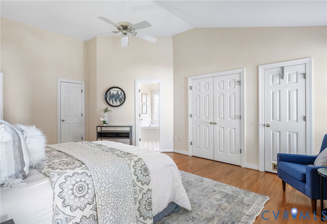 1608 Fairfield Green Road Henrico, VA 23238 - Photo 21 of 35 a bedroom with a bed and a chandelier