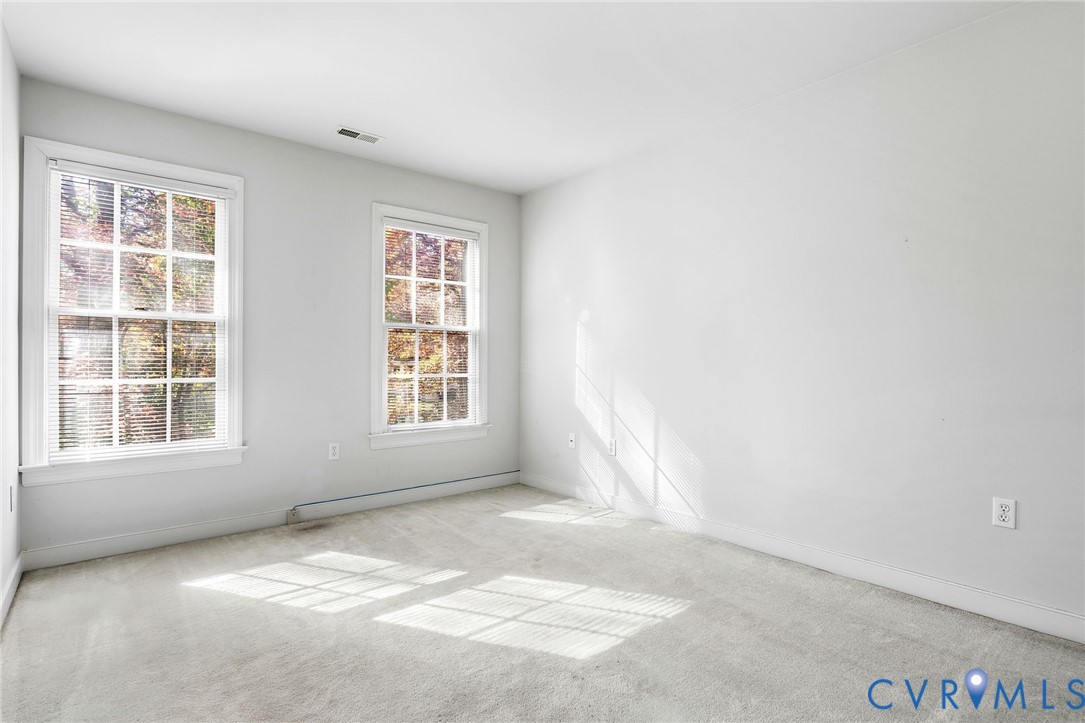 1608 Fairfield Green Road Henrico, VA 23238 - Photo 28 of 35 a view of an empty room with a window