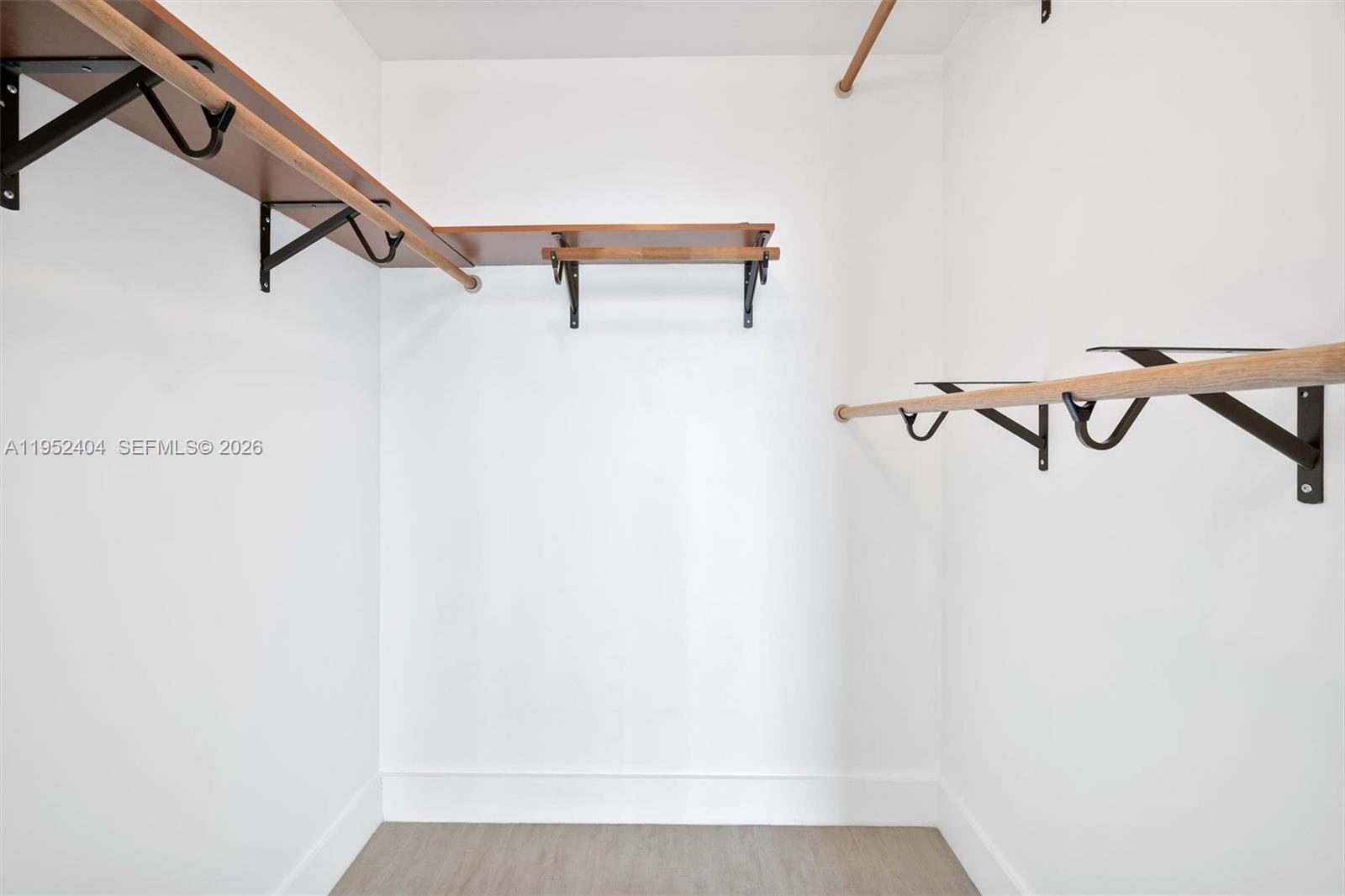79 Southwest 12th Street, Unit 4004S Miami, FL 33130 - Photo 14 of 29 a view of small space with racks on the wall