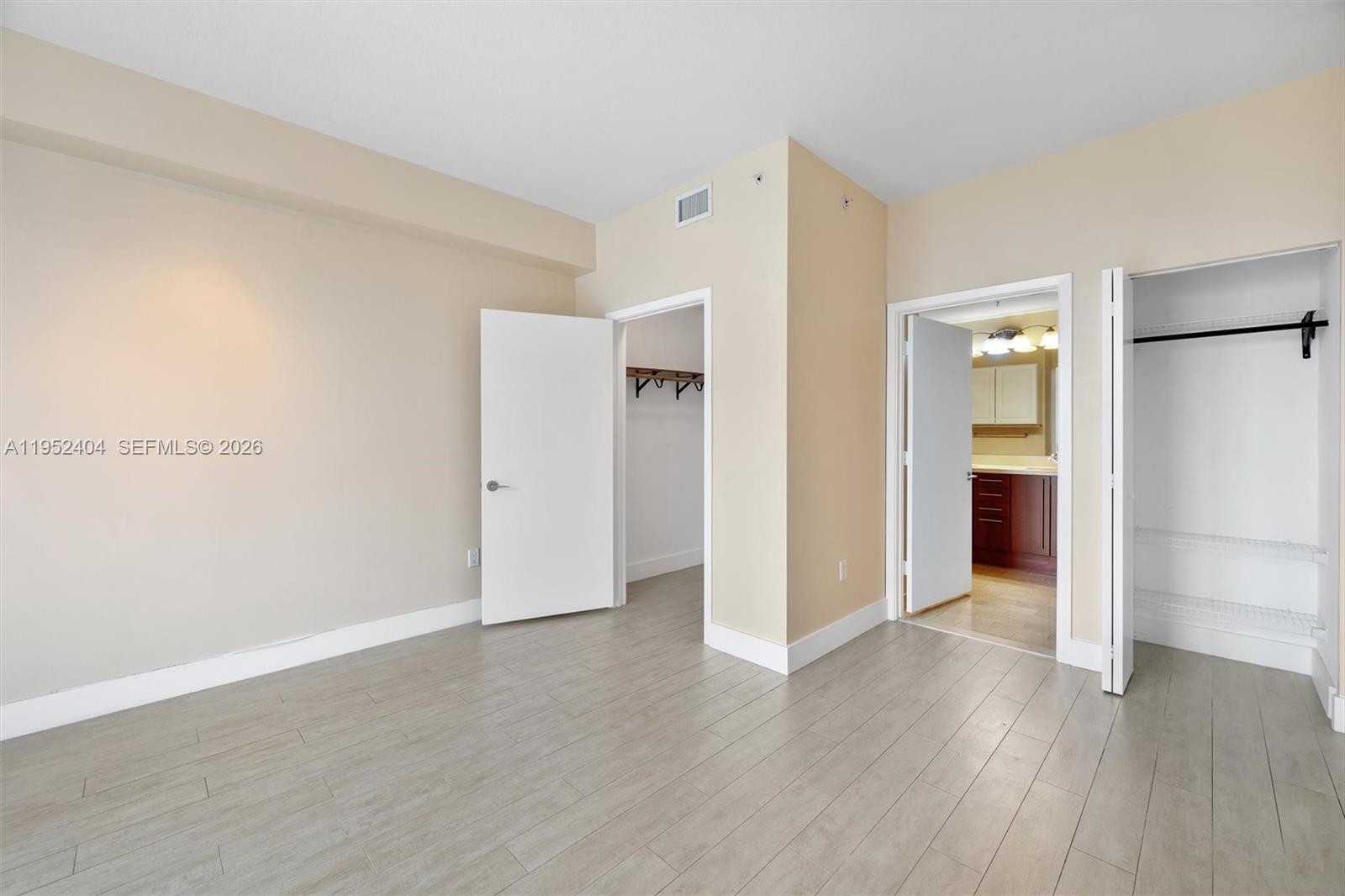 79 Southwest 12th Street, Unit 4004S Miami, FL 33130 - Photo 15 of 29 wooden floor in an empty room