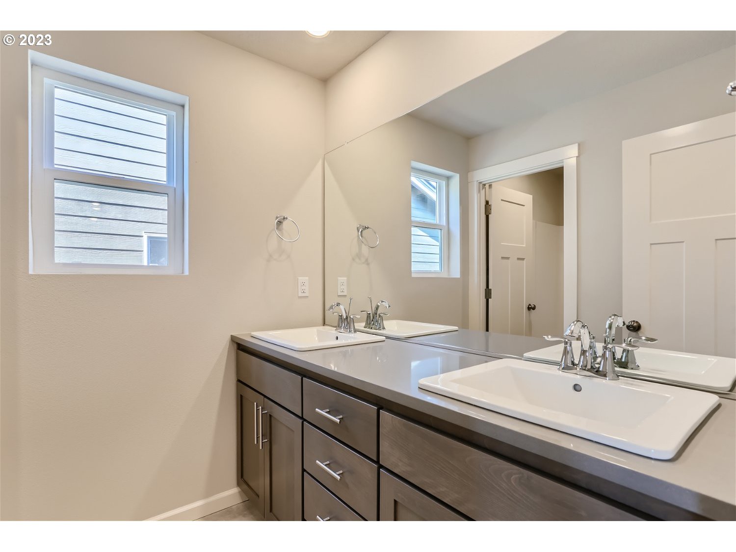 2772 Northeast Hill Road McMinnville, OR 97128 - Photo 15 of 26 a bathroom with a sink double vanity and a mirror