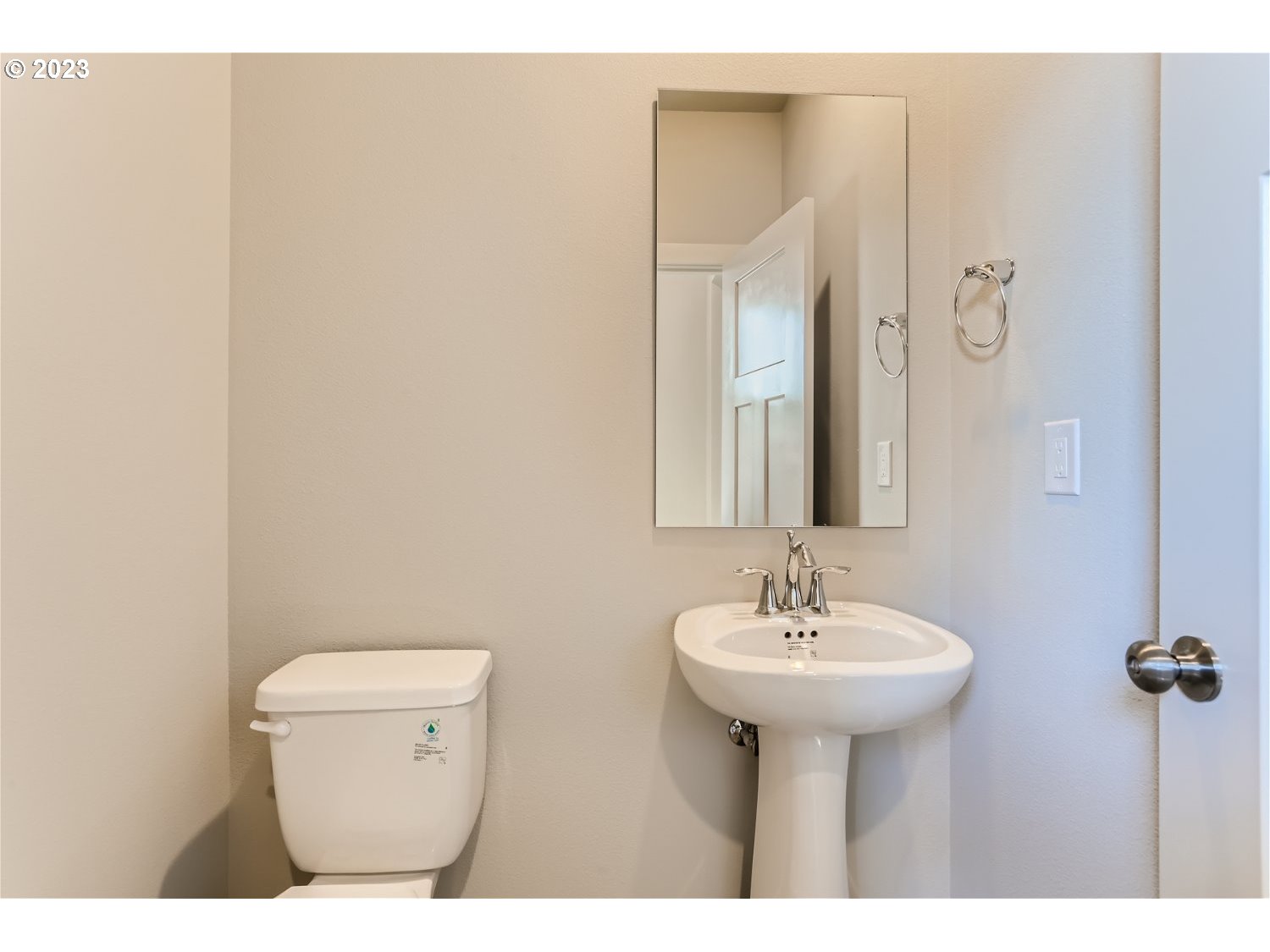 2772 Northeast Hill Road McMinnville, OR 97128 - Photo 5 of 26 a bathroom with a sink a mirror and a toilet