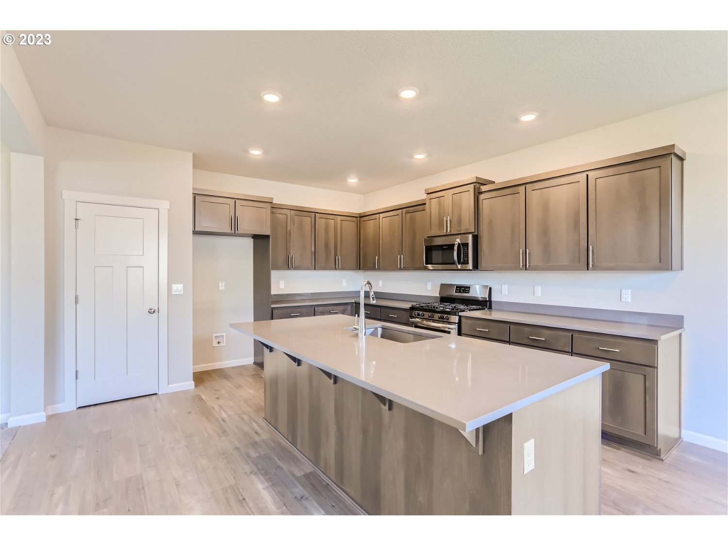 2772 Northeast Hill Road McMinnville, OR 97128 - Photo 6 of 26 a kitchen with stainless steel appliances granite countertop a sink stove and refrigerator