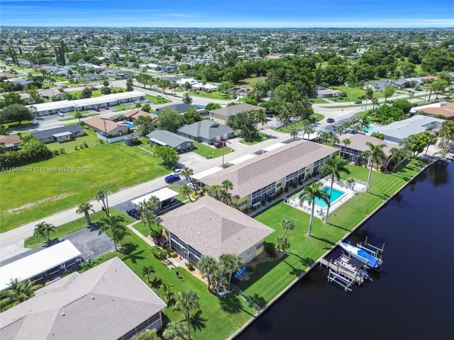 an aerial view of a house with a garden