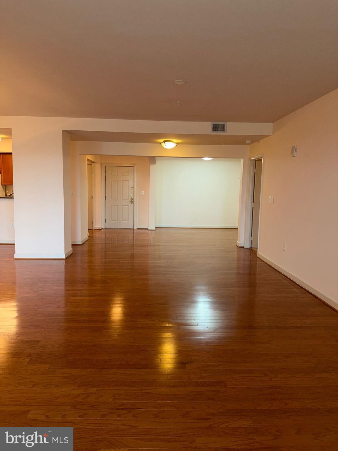 485 Harbor Side Street Woodbridge, VA 22191 - Photo 28 of 28 a view of an empty room with wooden floor and a window