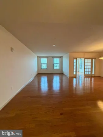 a view of a livingroom with wooden floor