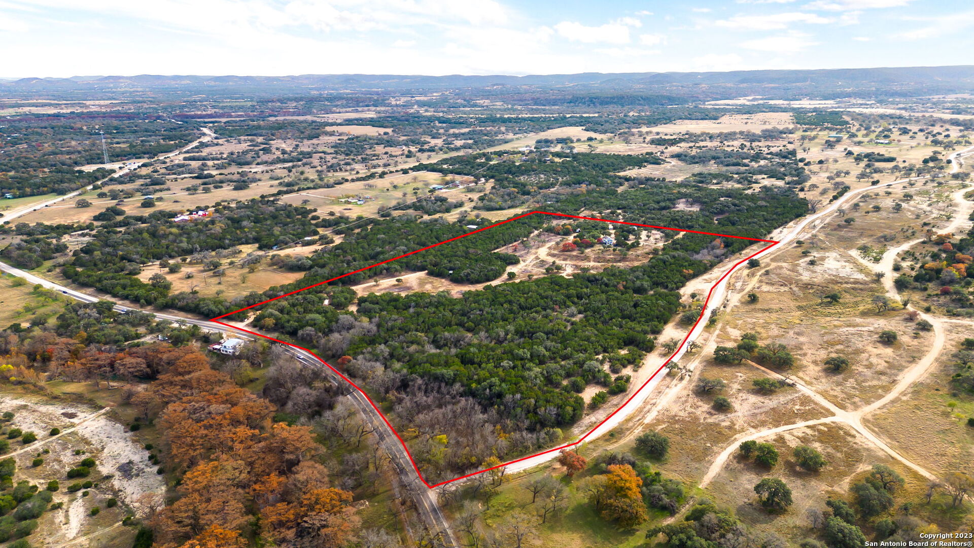 8417 Highway 16 Bandera, TX 78003 - Photo 11 of 28 an aerial view of residential houses with outdoor space