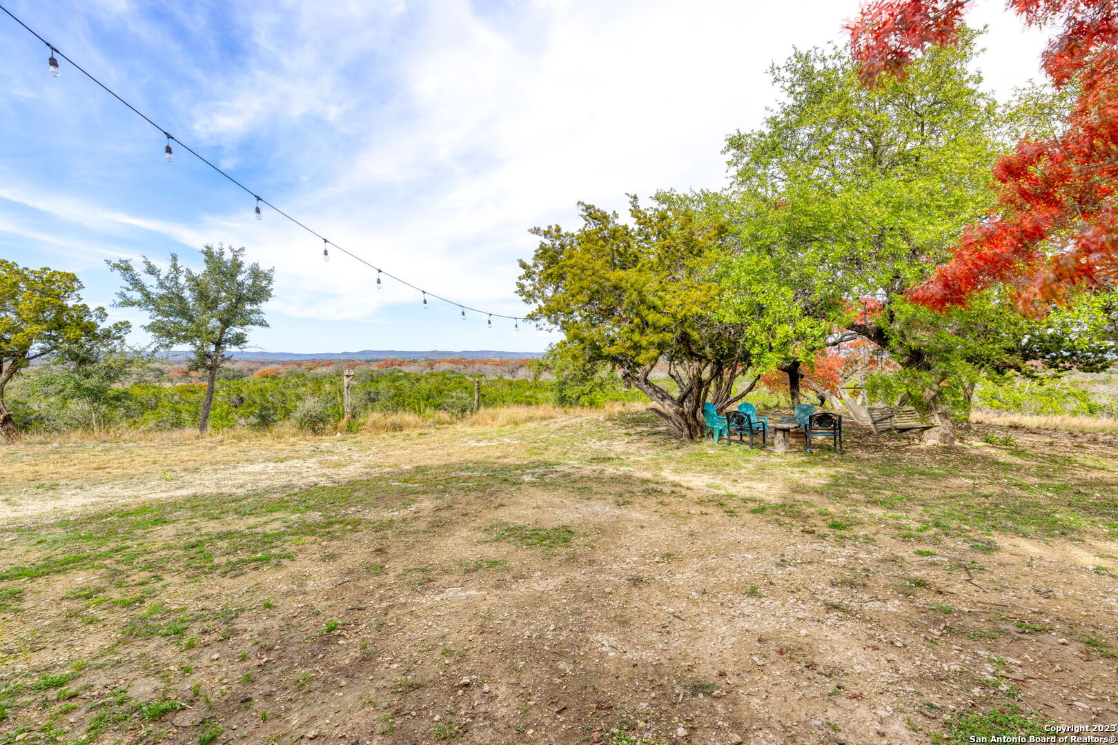 8417 Highway 16 Bandera, TX 78003 - Photo 24 of 28 a view of an outdoor space and a yard