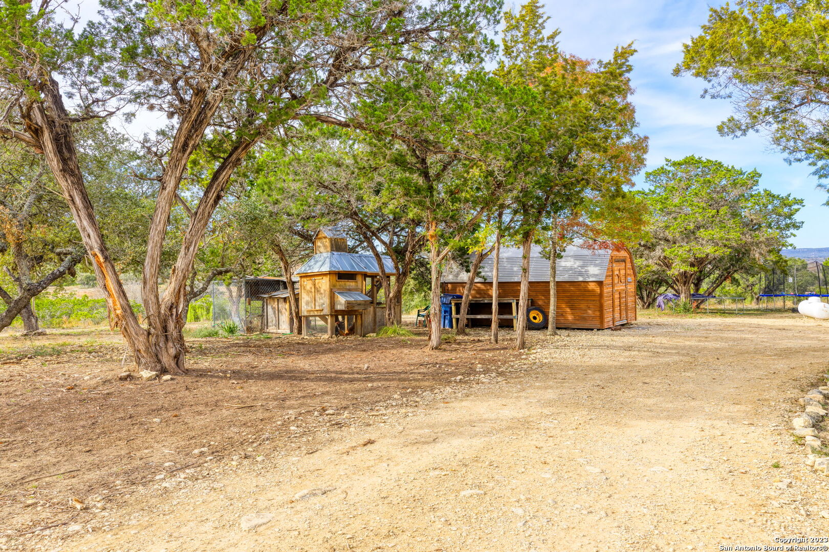 8417 Highway 16 Bandera, TX 78003 - Photo 27 of 28 front view of a house with a trees